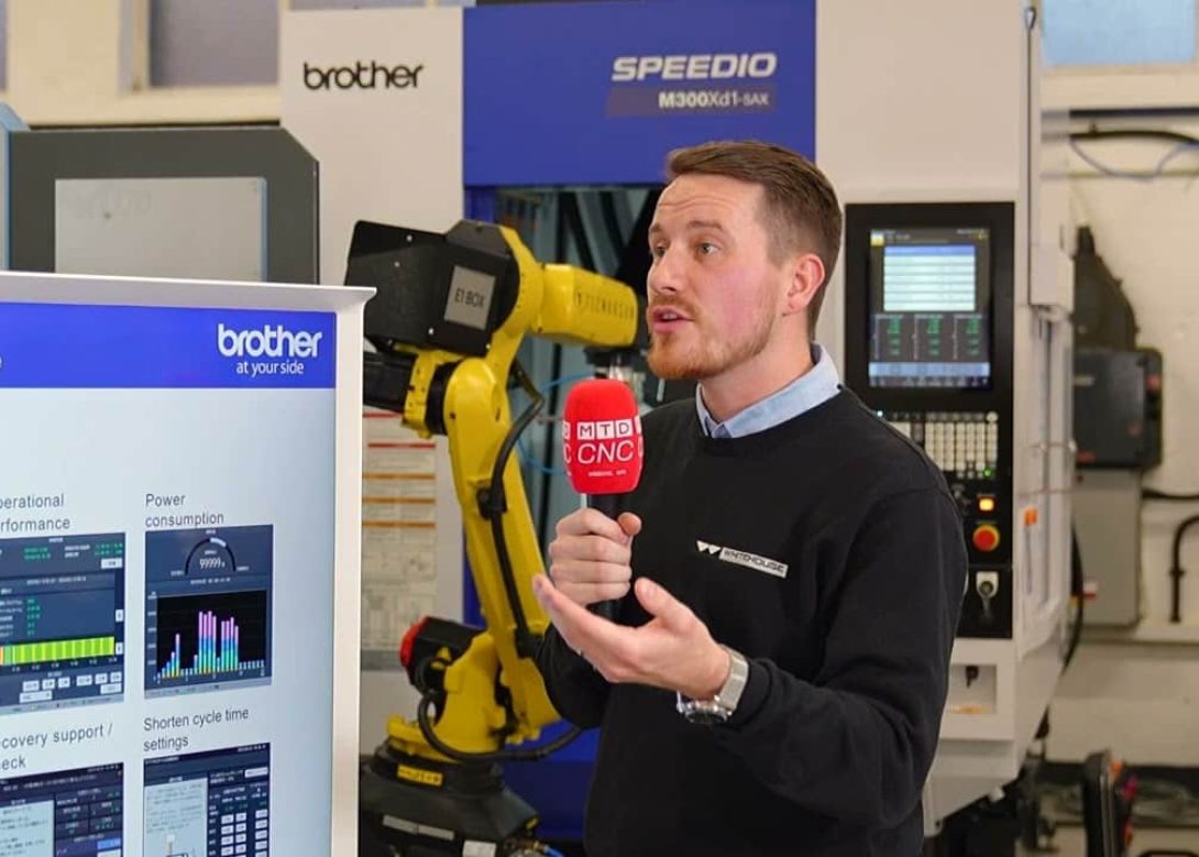 MTD CNC presenter explaining the Brother CNC-D00 controller user interface features at the SECO ITI Event 2026, with visibility and performance monitoring screens shown